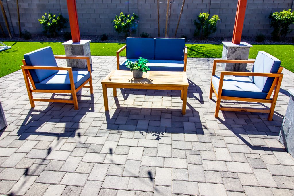 Rear Pavers Patio With Couch, Table And Two chairs